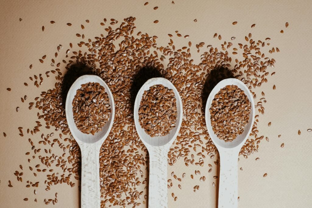 Alsi seeds in a wooden spoon – Natural superfood with amazing health benefits | अलसी के बीज के फायदे